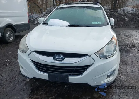 2012 Hyundai Tucson Limited из США, поврежденный, VIN KM8JUCAC5CU382313